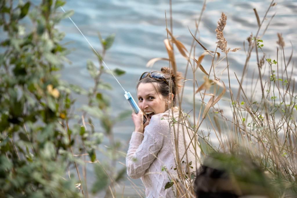 Jennifer Lavers collects a water sample from an east-coast river Water